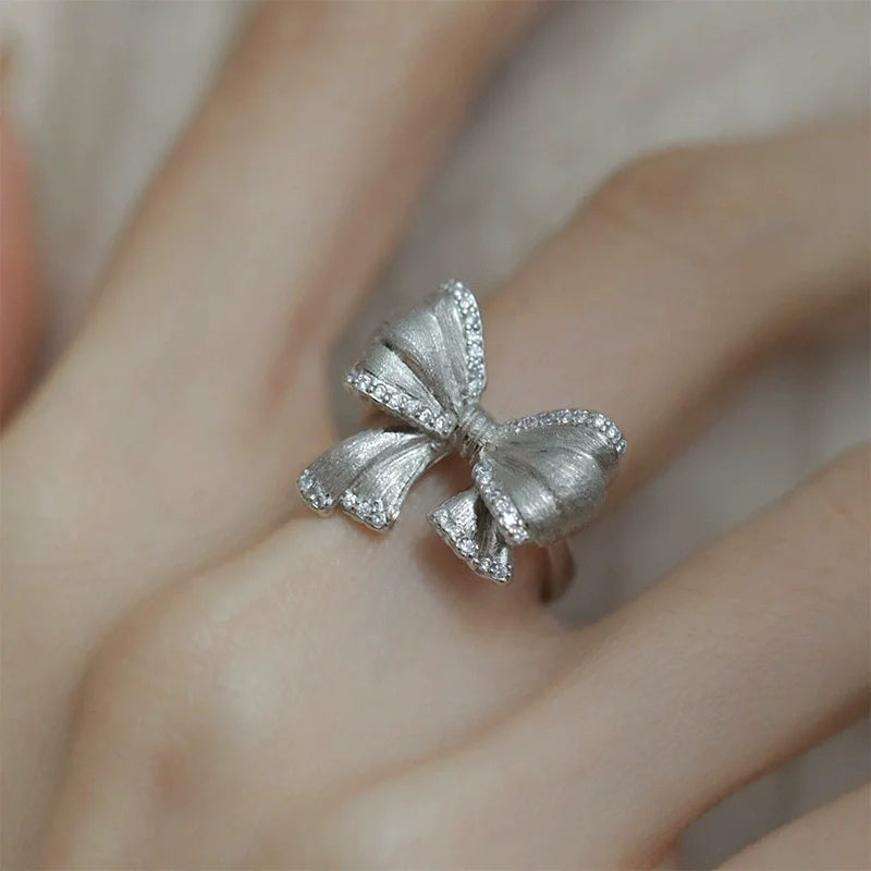 PANJBJ 925 Sterling Silver Bowknot Heart Ring – Adjustable Romantic Minimalist Jewelry Gift for Women