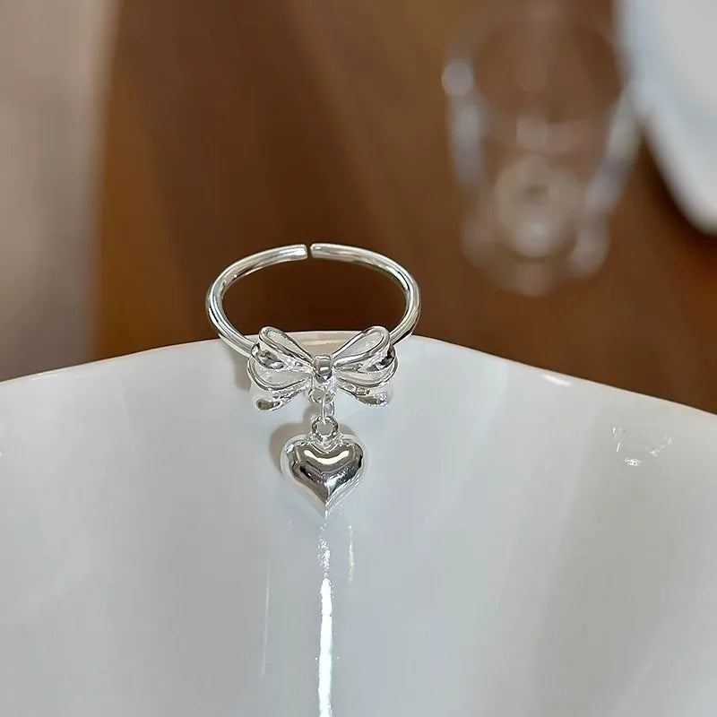 PANJBJ 925 Sterling Silver Bowknot Heart Ring – Adjustable Romantic Minimalist Jewelry Gift for Women